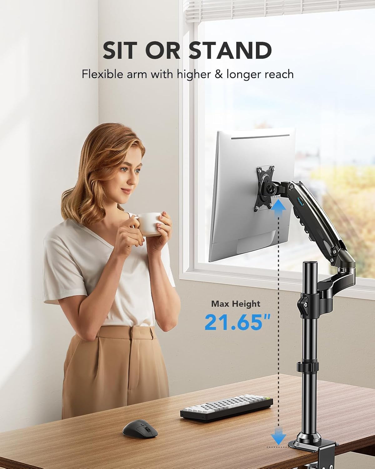 Woman holding a cup by HUANUO monitor mount showing max height of 21.65 inches.